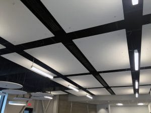 Black LSD High Induction Slot Diffusers between acoustical panels